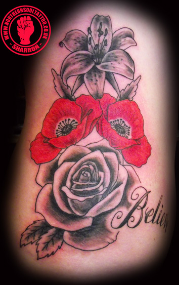 Lily poppies and a rose on ribs Here is a piece I have done recently on a